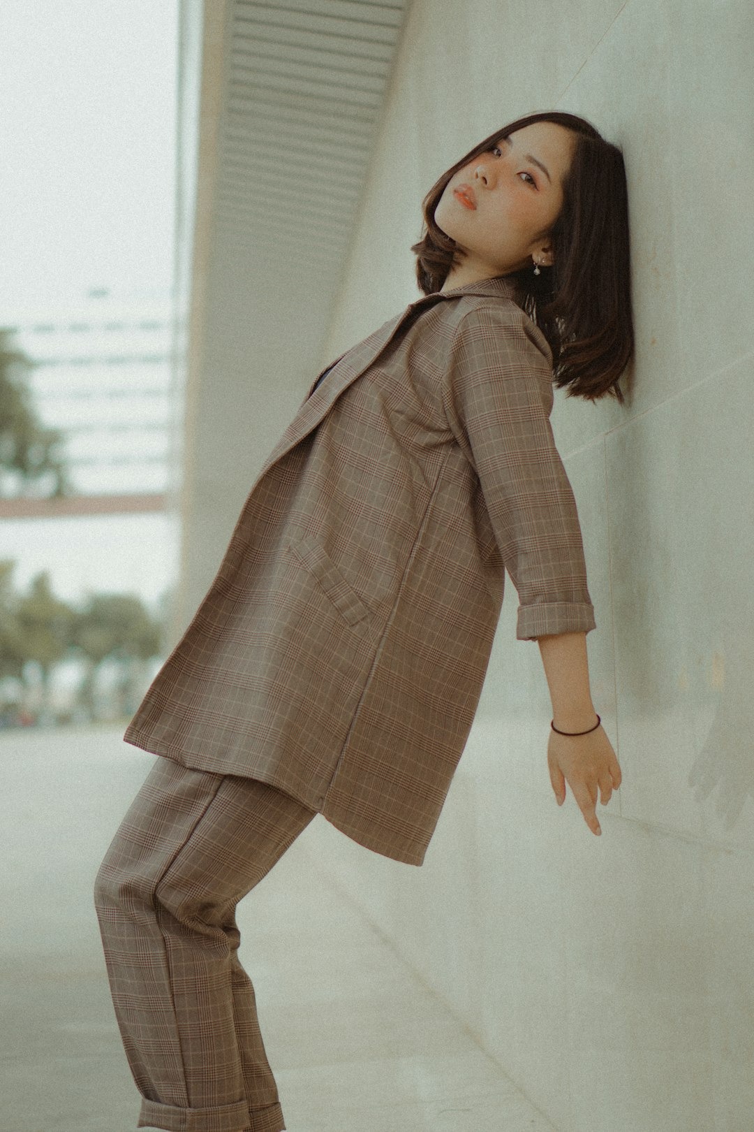 model posing with beige colors